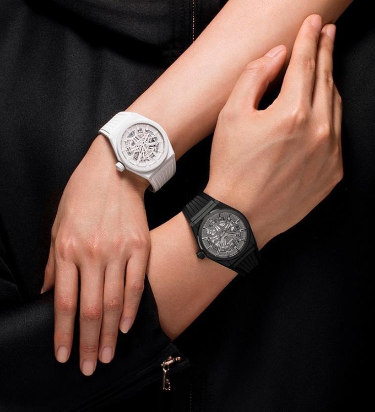 The 41 mm fake watches are made from ceramic.