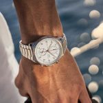 The 44.6 mm fake watches have white dials.
